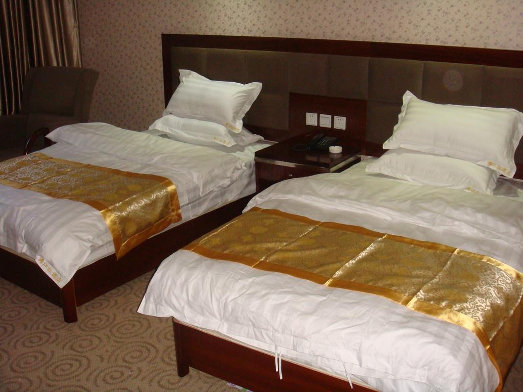 Jiuzhaigou Man Jiang Hong Hotel Rom bilde