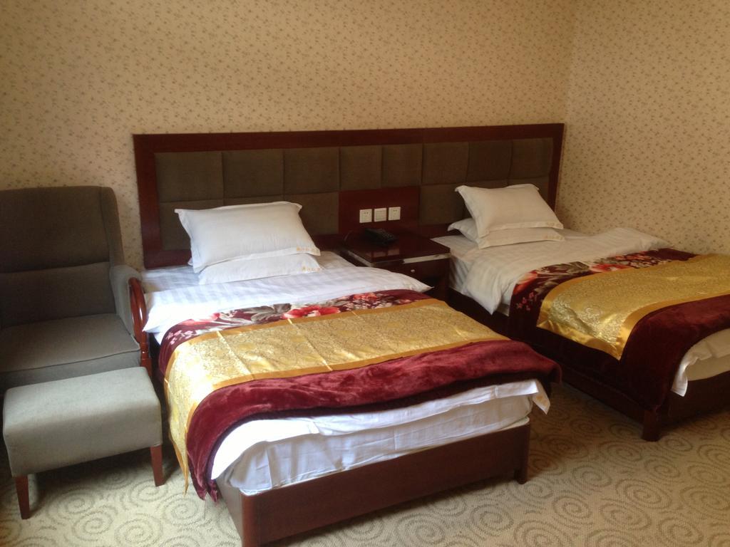 Jiuzhaigou Man Jiang Hong Hotel Rom bilde