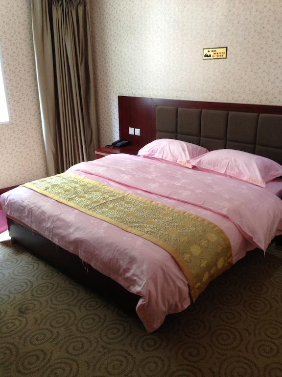 Jiuzhaigou Man Jiang Hong Hotel Rom bilde